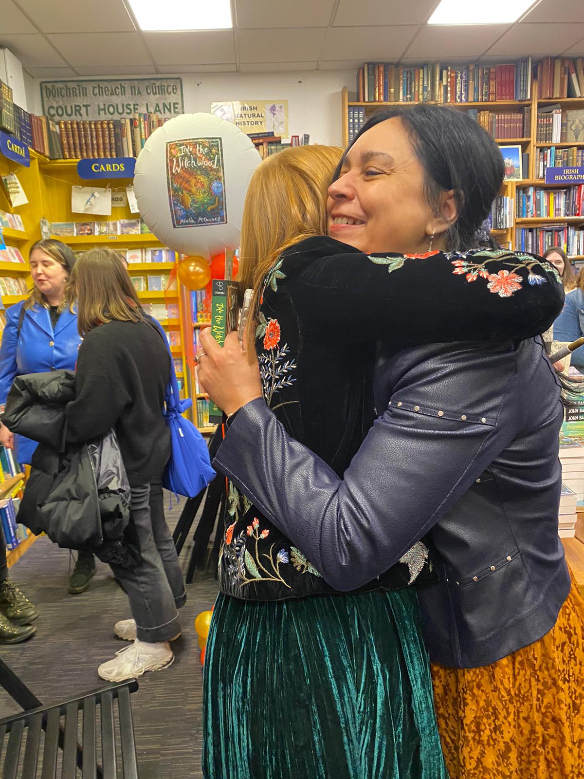 Meabh hugging a friend